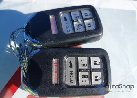 2015 Honda Odyssey Touring/Touring Elite z USA, uszkodzony, nr VIN 5FNRL5H98FB082309